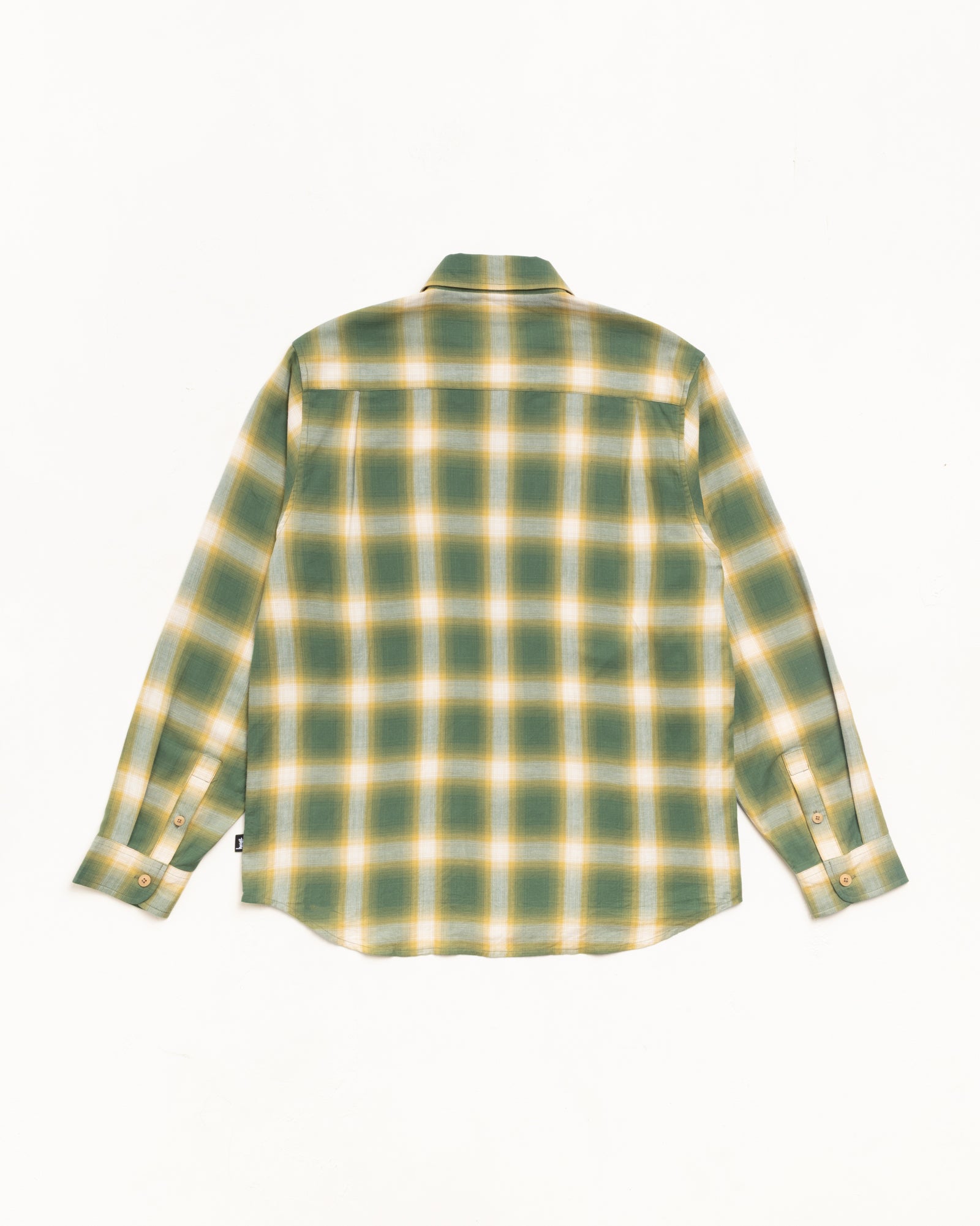 Green ombre plaid long-sleeve shirt, back view with button cuffs and curved hem