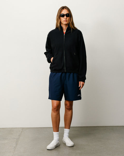 Short unisexe Sport en tissu technique bleu marine avec logo Stüssy à la jambe gauche