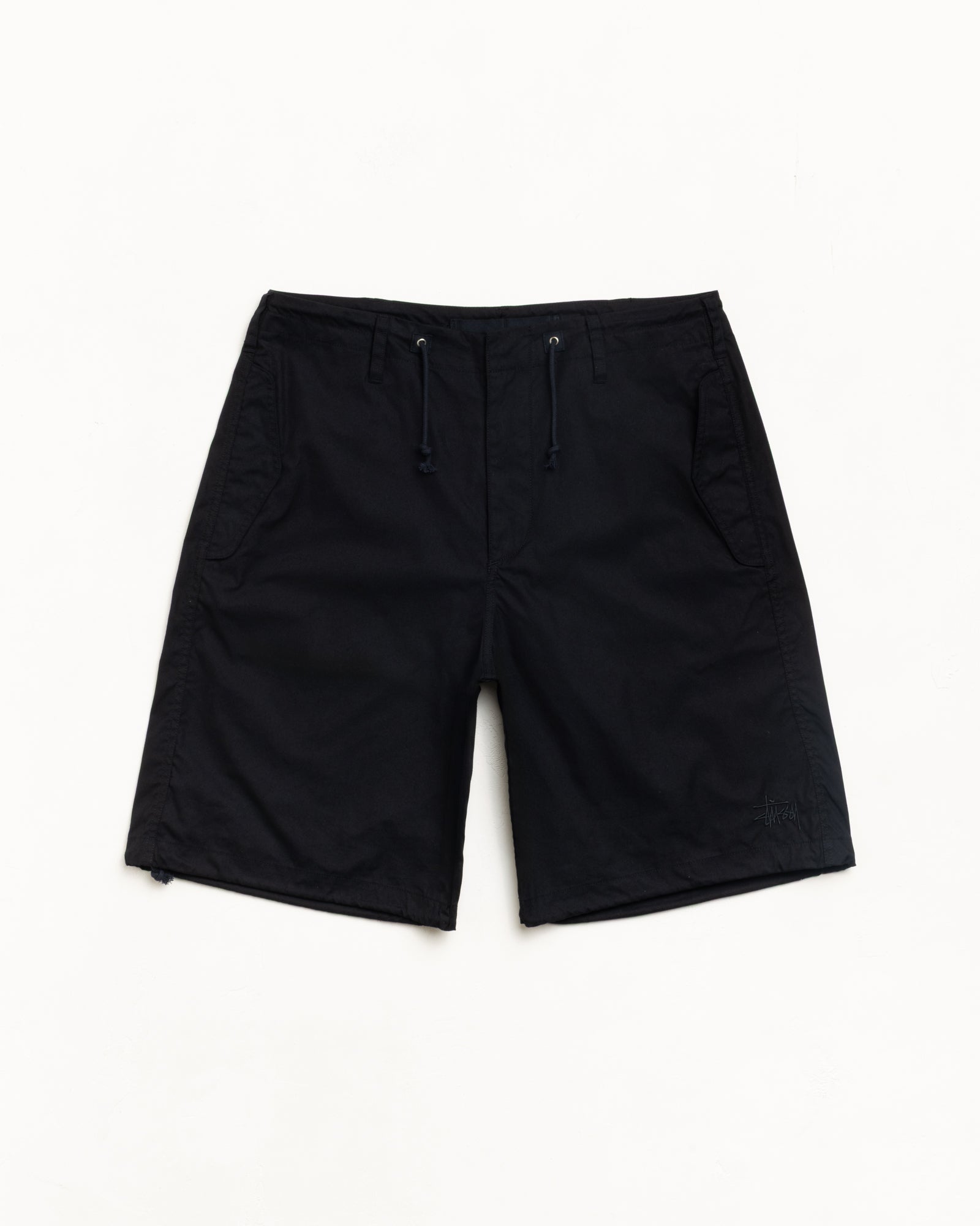 Black drawcord shorts with slant pockets and subtle logo embroidery
