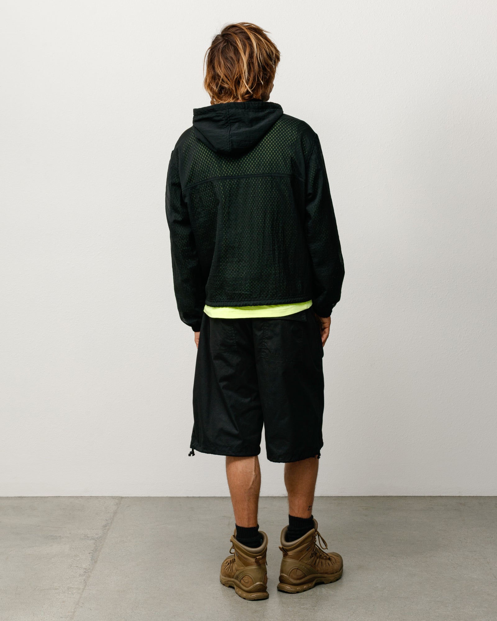 Surplus Short Unisex Baggy Cotton Nylon In Black, rear view with patch pockets and drawcord hem