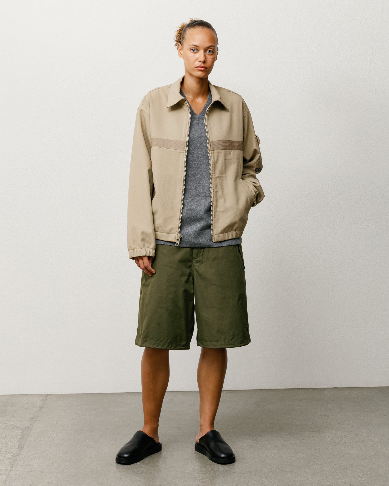 Olive Surplus Short, knee-length baggy style shown on model