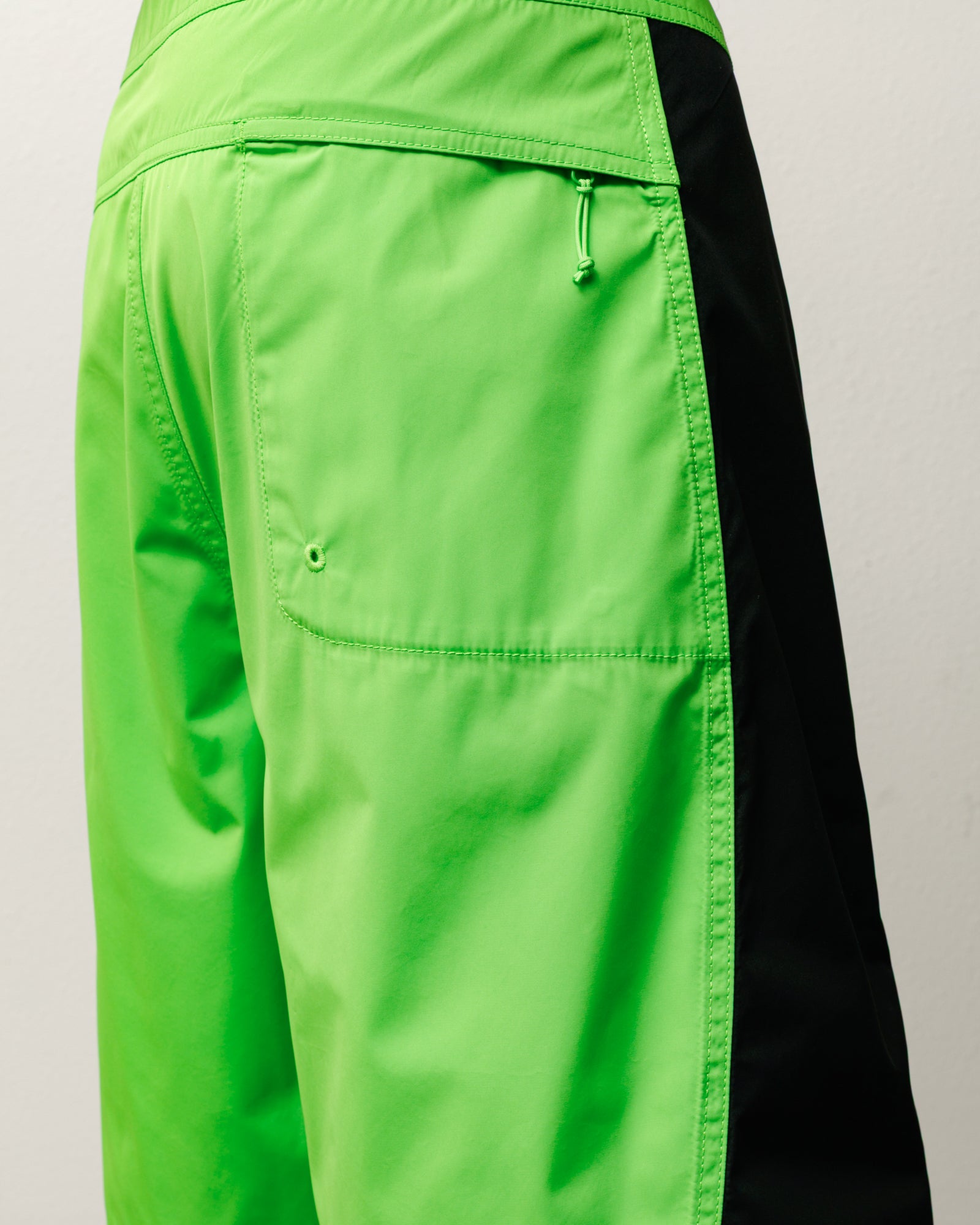 Curved Panel Board Short Mens Regular In Green with black contrast side panel.