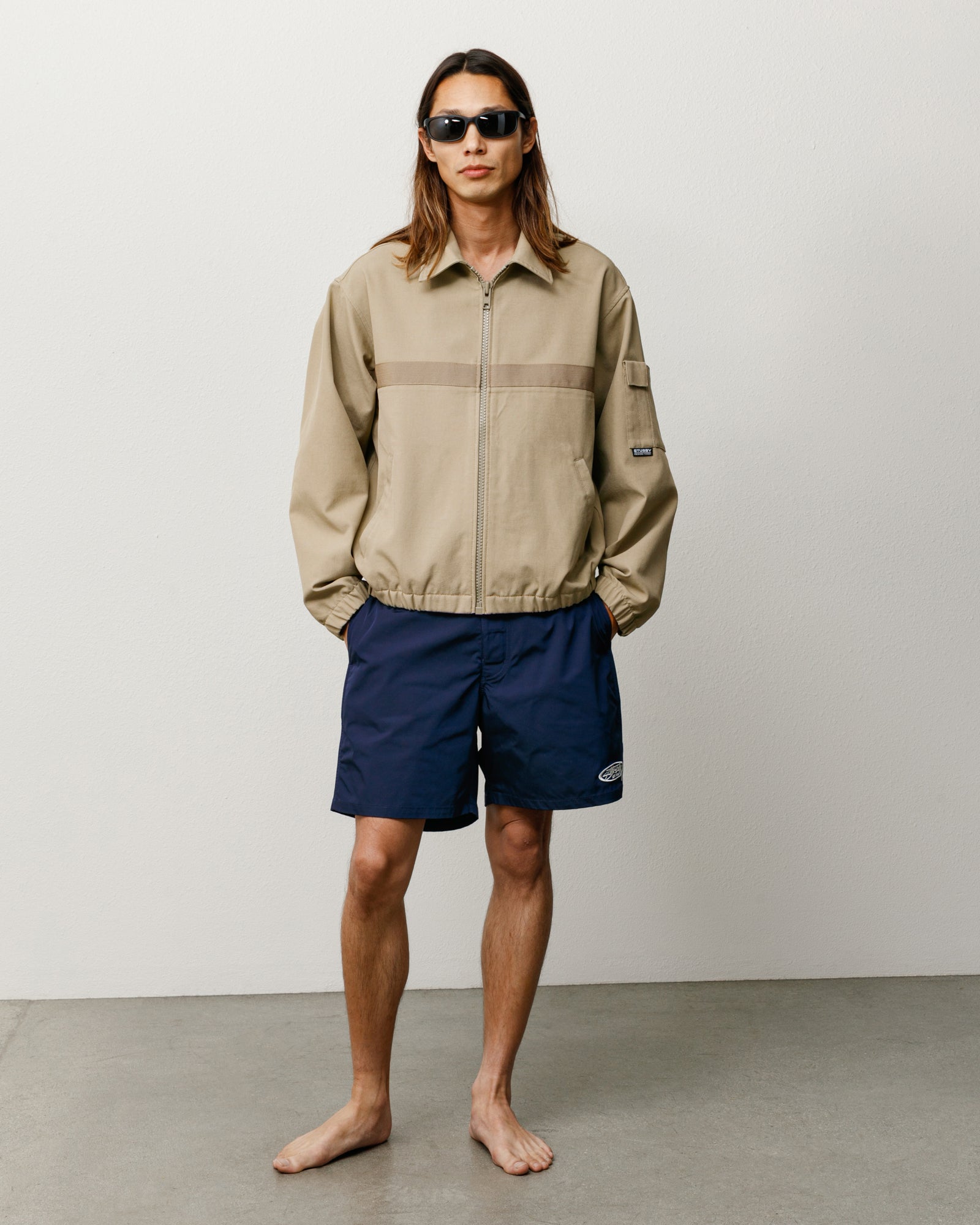 Blue Unisex Board Short, Above-Knee Length With Side Pockets, Shown On Model