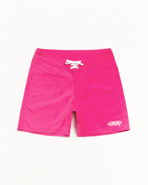 Bright pink board shorts with white lace-up waist, Velcro fly and logo on left leg