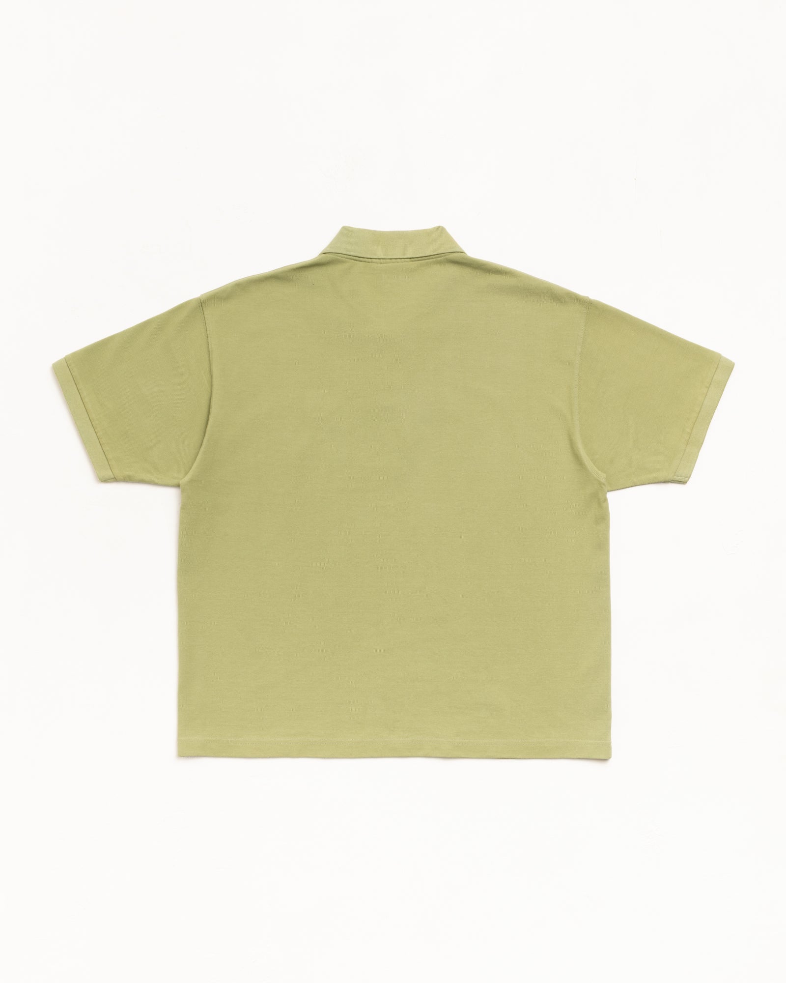 Classic pique polo short sleeve in Leaf, flat lay back view