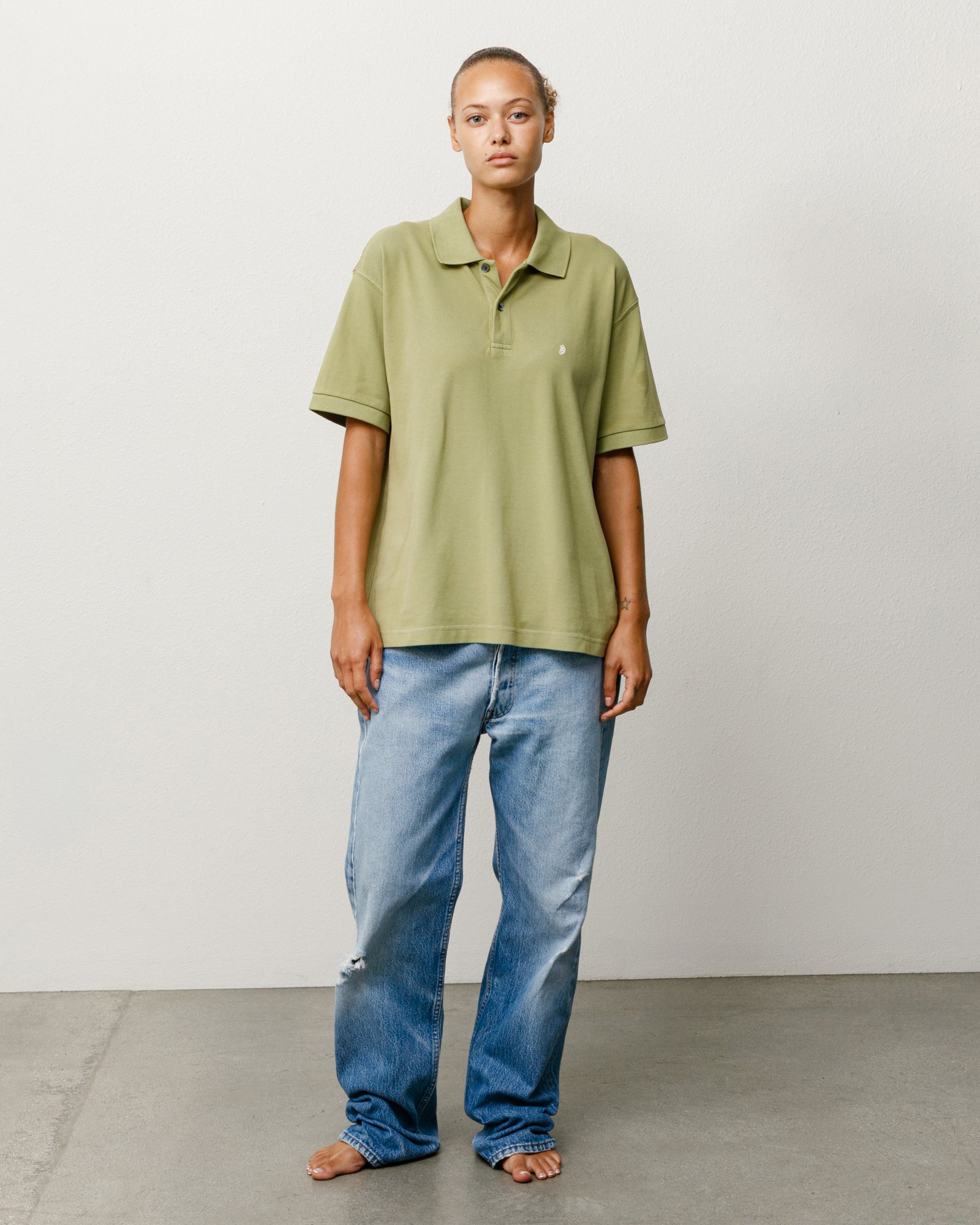 Classic pique polo unisex short sleeve in Leaf green with rib collar and small chest logo
