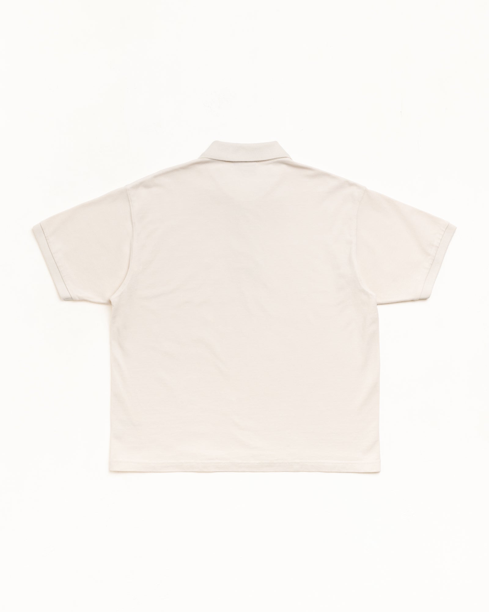 Classic Pique Polo Short Sleeve In Off White, Back Flat Lay With Rib Collar And Cuffs