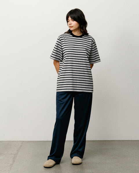 Black striped short sleeve tee with ribbed crewneck and relaxed fit