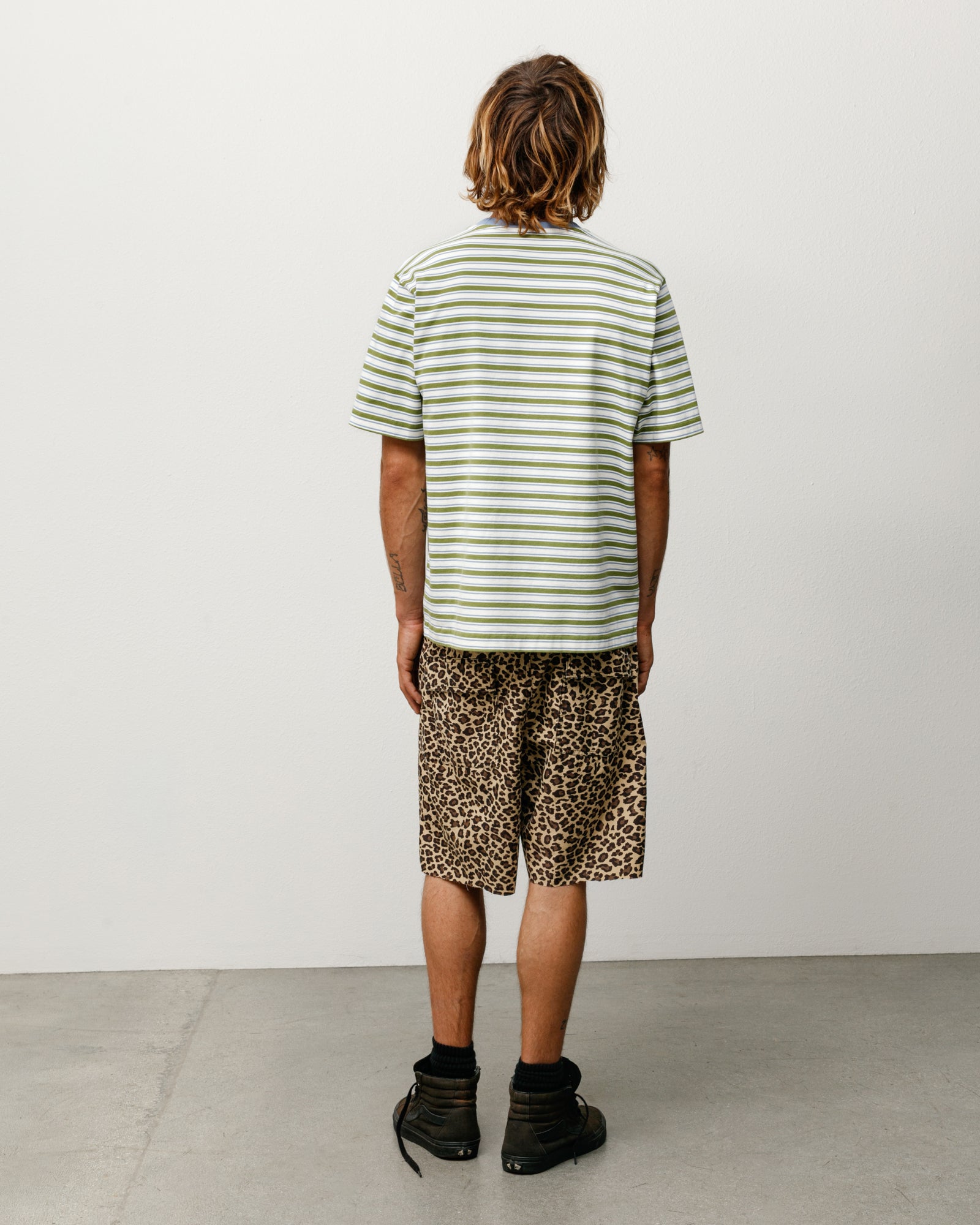 Moss green striped short-sleeve tee, relaxed fit cotton jersey, back view on model