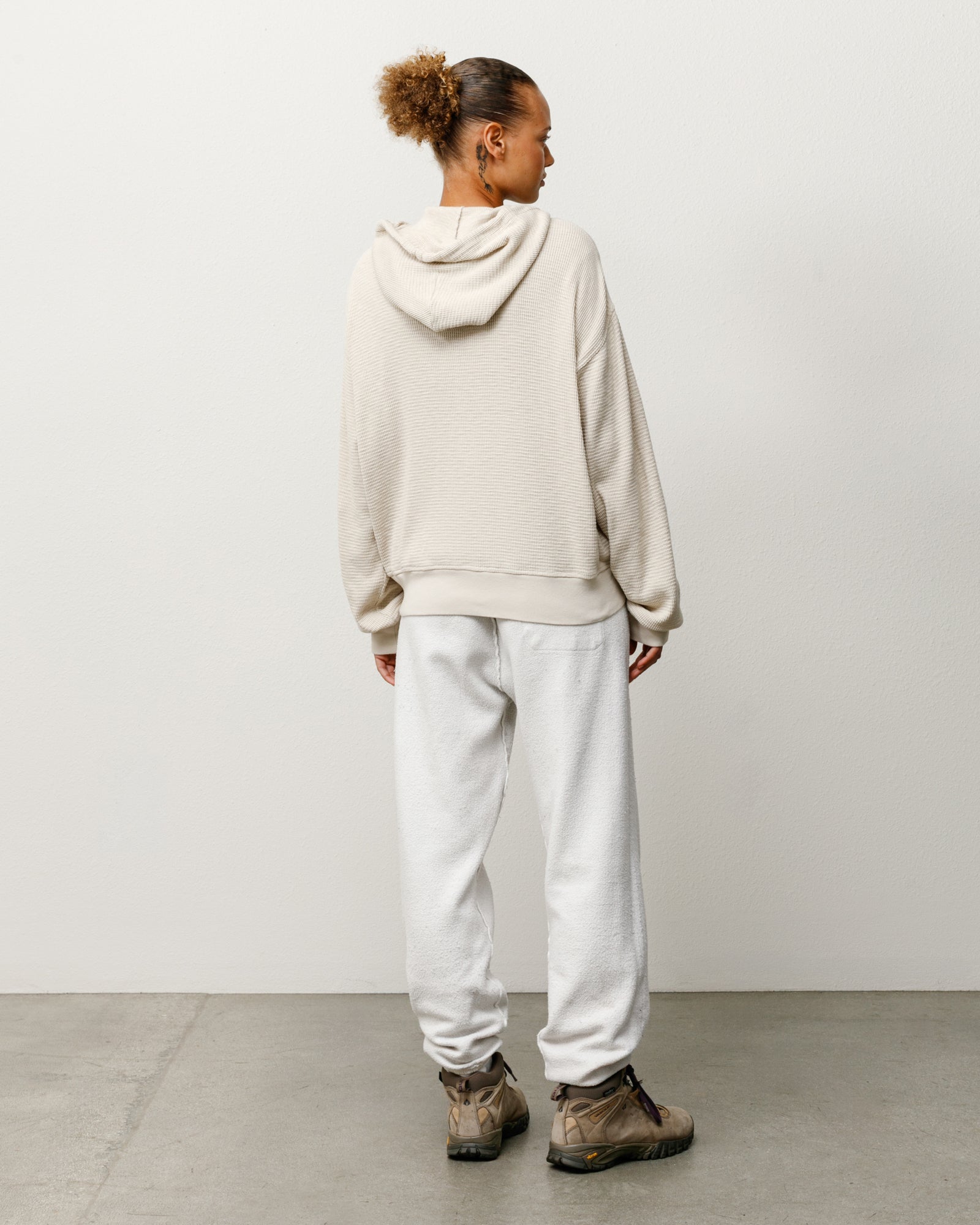 Lightweight thermal hoodie, unisex long sleeve in bone, back view on model