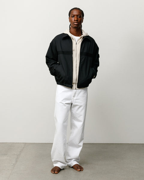 Unisex black mechanic jacket with long sleeves and zip front, lightweight with elastic cuffs