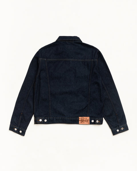 Veste camionneur en denim Rinsed Indigo, vue dos, surpiqûres contrastées et patch Stüssy en suède