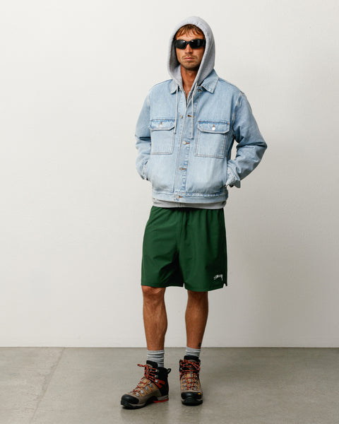 Veste trucker en denim coloris indigo délavé clair