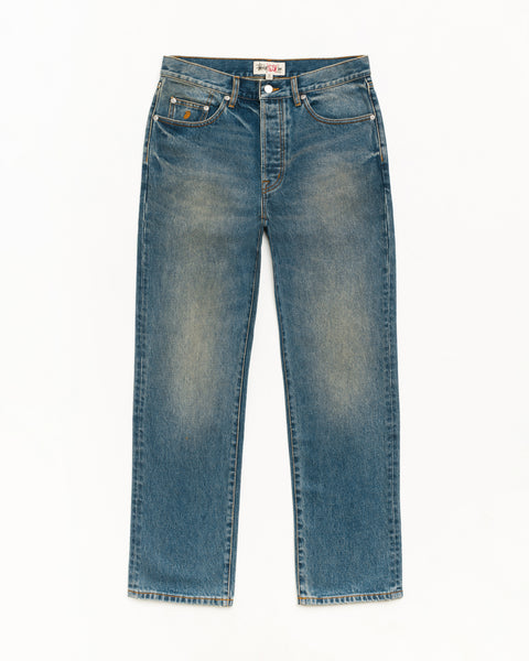 Jean slim en denim Stüssy dans le coloris Indigo délavé foncé