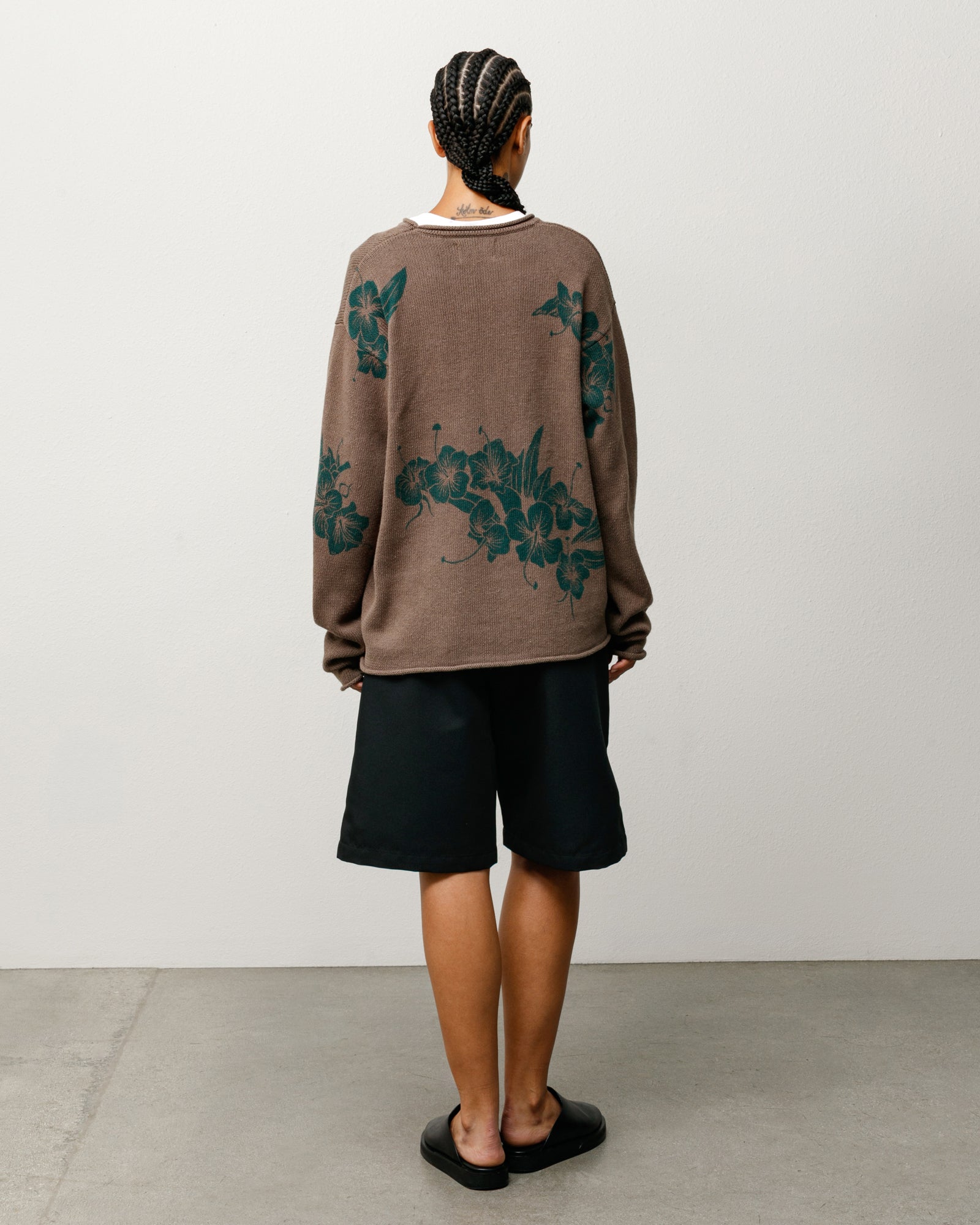 Floral Roll Neck Sweater Unisex Long Sleeve In Brown with Green Floral Print, Back View On Model