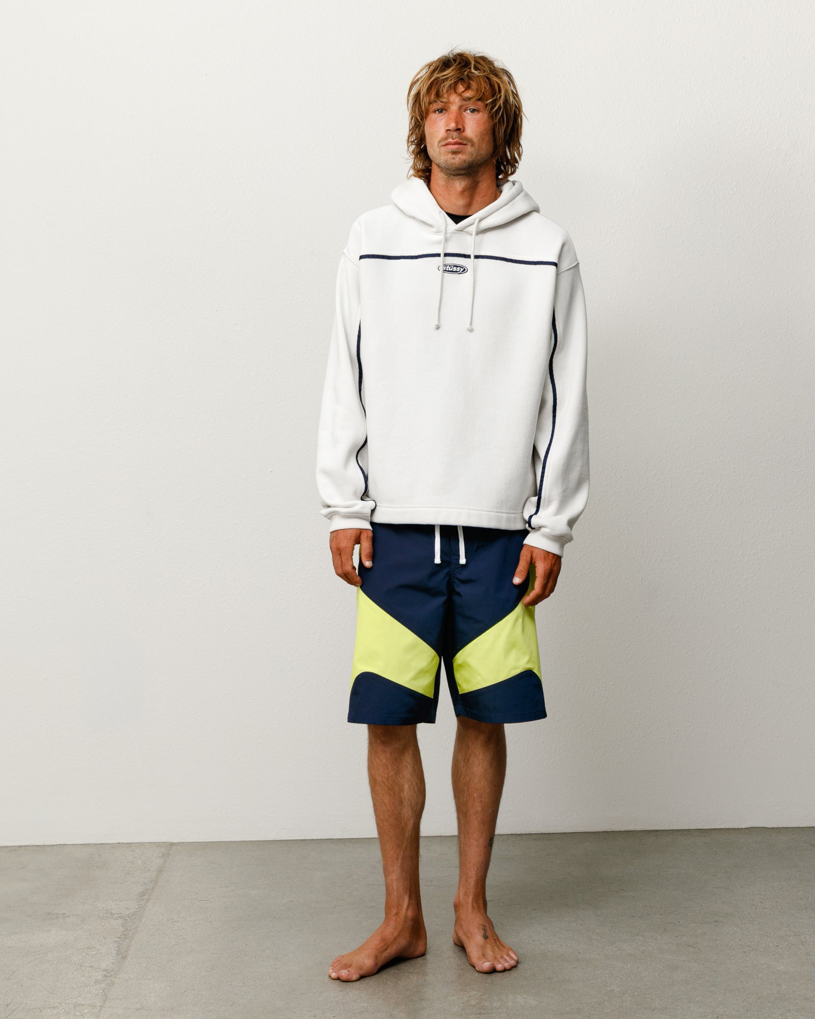 Stone oval pullover hoodie with contrast piping, drawcord hood and ribbed cuffs, unisex fit