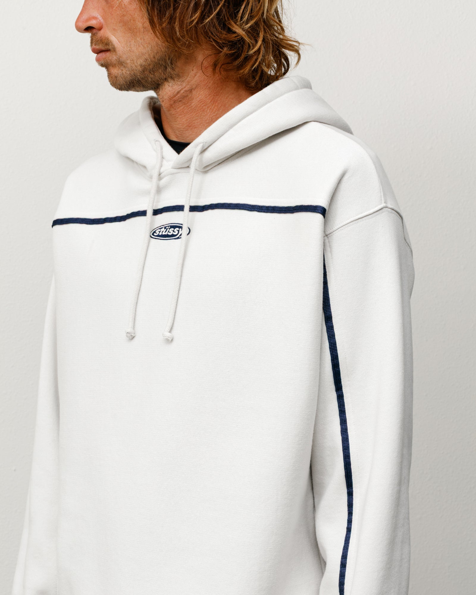 Stone unisex pullover hoodie with drawcords, navy piping and oval chest logo