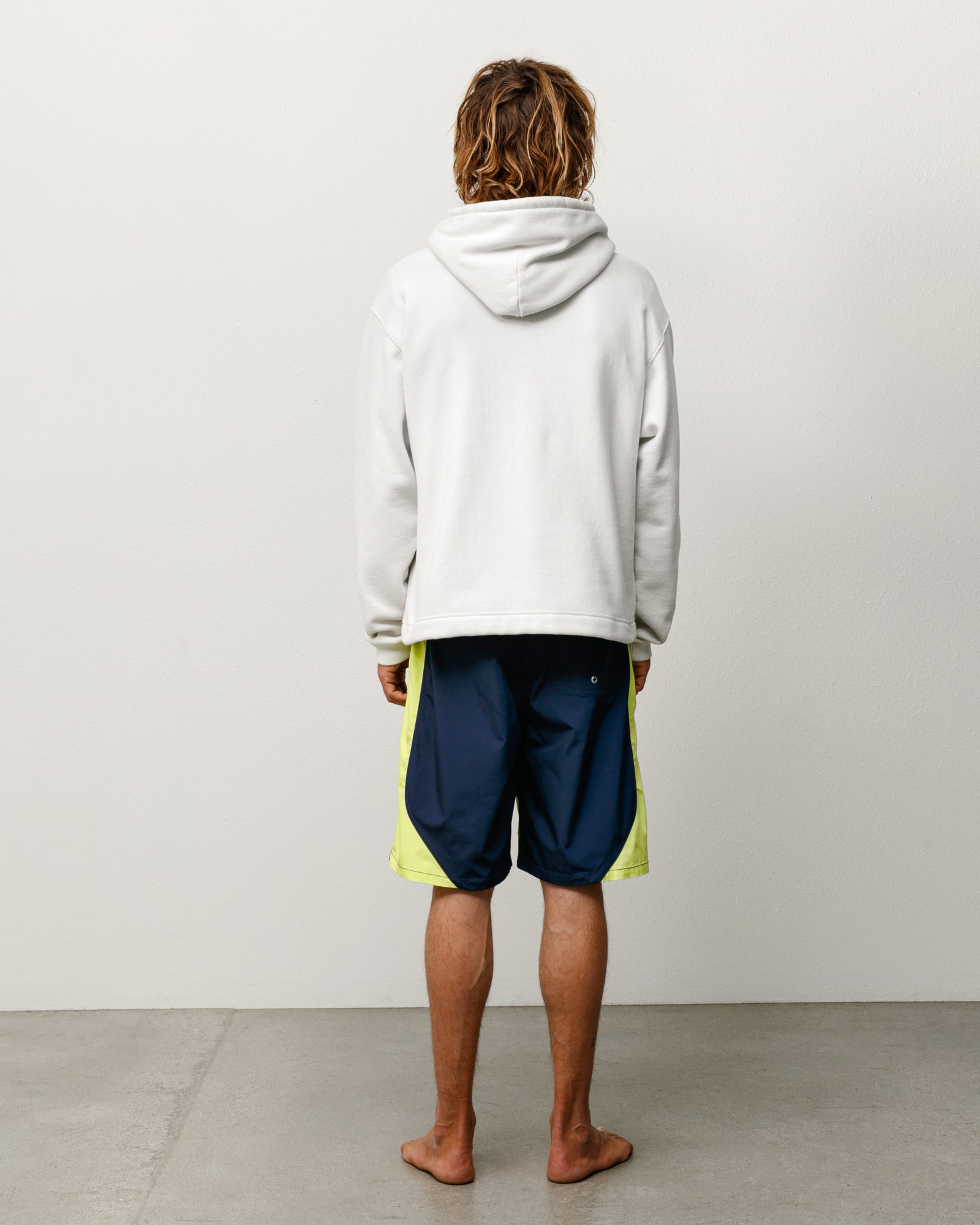 Unisex Pullover Hoodie Long Sleeve In Stone Back View On Model
