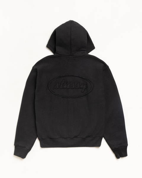Black zip hoodie with cursive applique back logo, unisex long sleeve