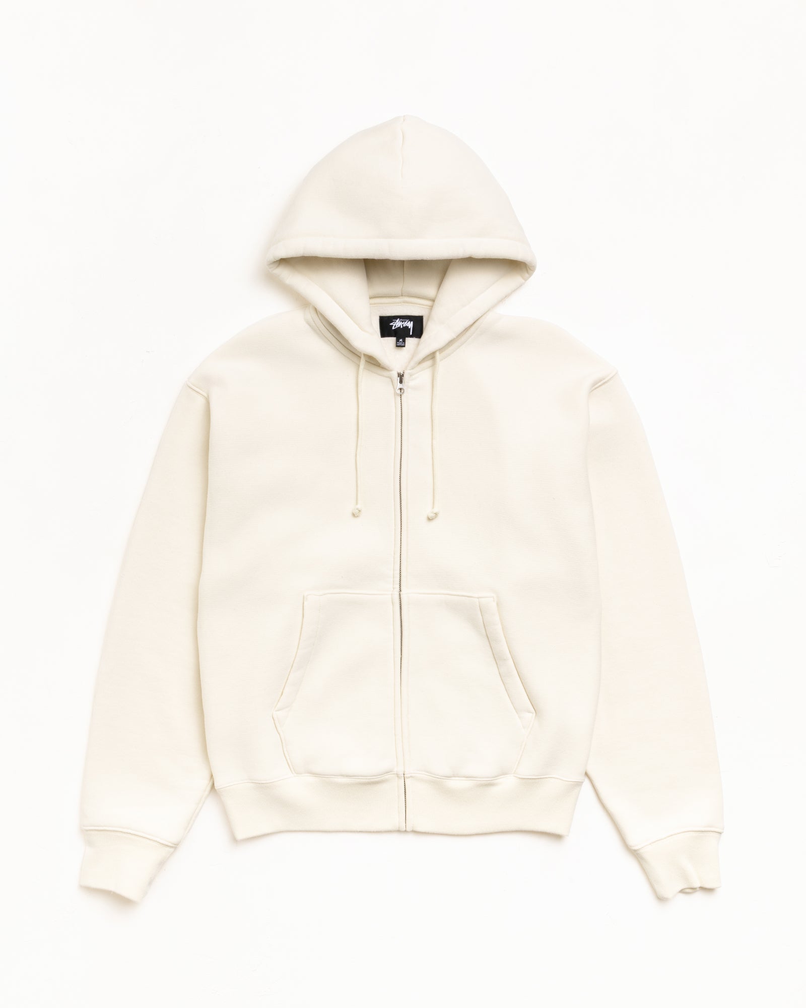 Natural zip hoodie with drawstring hood, kangaroo pockets, and ribbed cuffs and hem