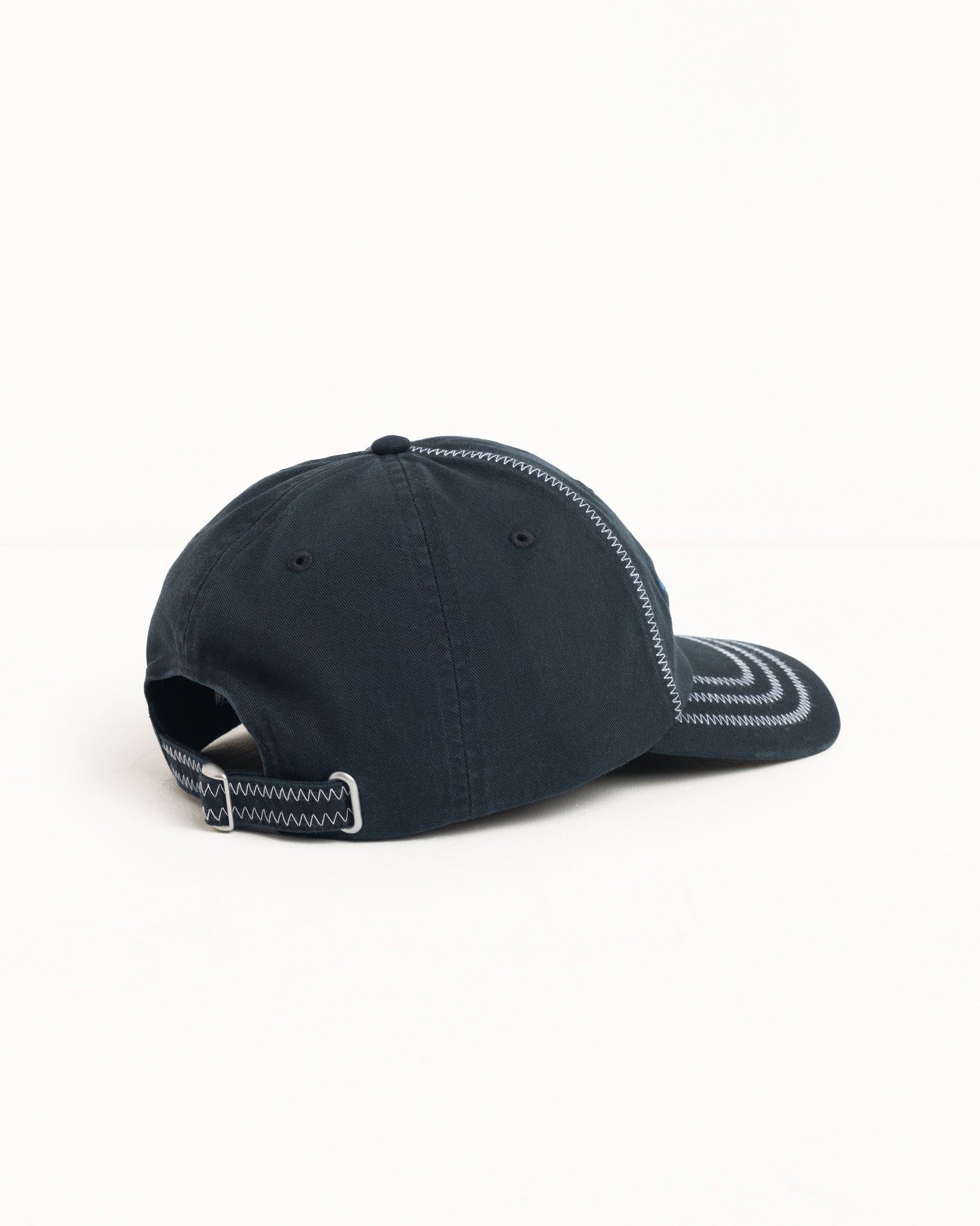 Black Low Profile Cap With Contrast Zig-Zag Stitching And Adjustable Strapback