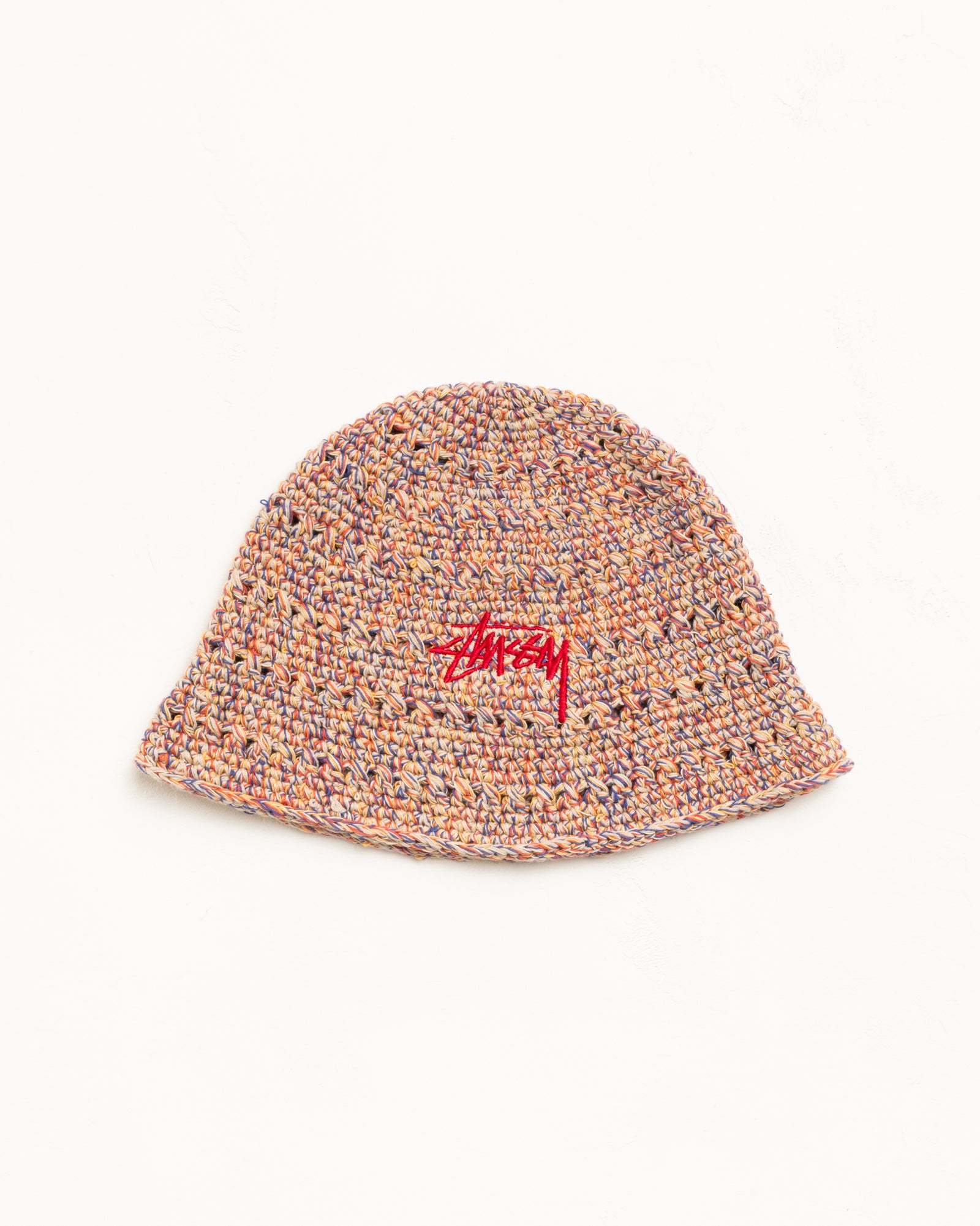Multicolour knit bucket hat in tan tones with red stock logo embroidery, hemp knit texture