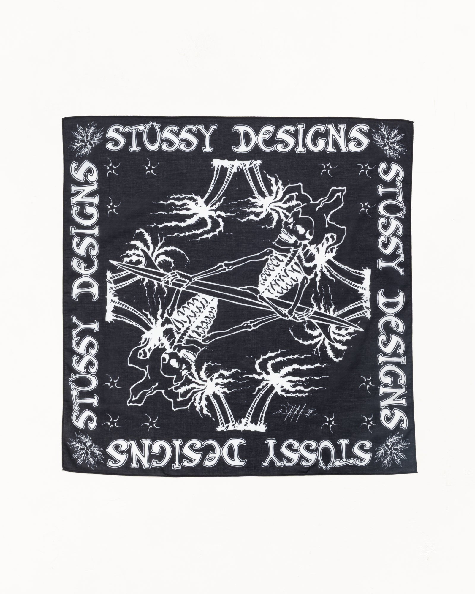 Black cotton bandana with white skeleton surfer graphic and Stussy Designs border