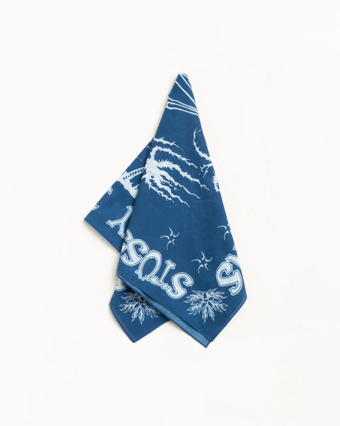 Blue cotton bandana with white graphic print, folded display, unisex accessory