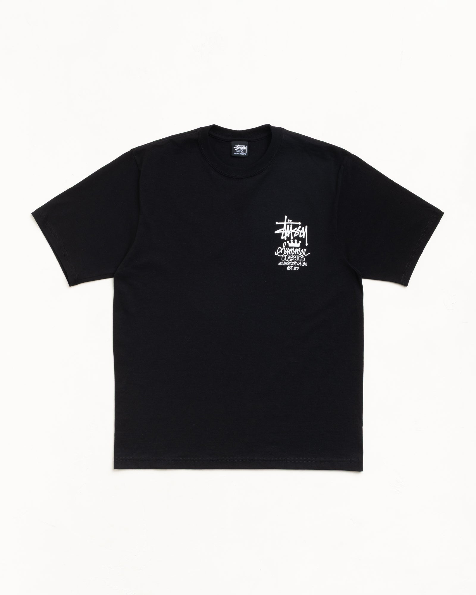 Unisex short sleeve tee in black with chest logo print