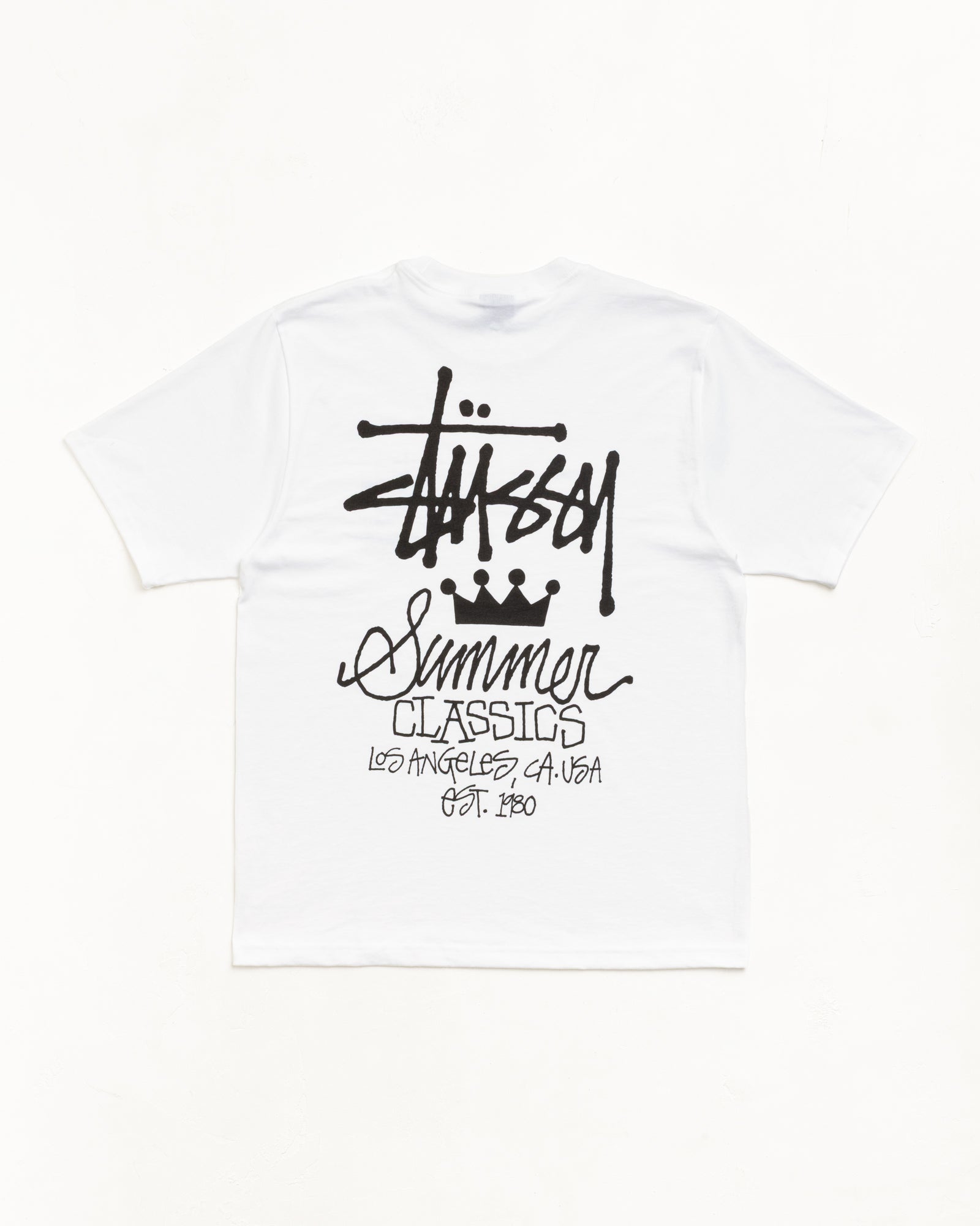 White unisex short-sleeve tee with bold black back script graphic; back view shown
