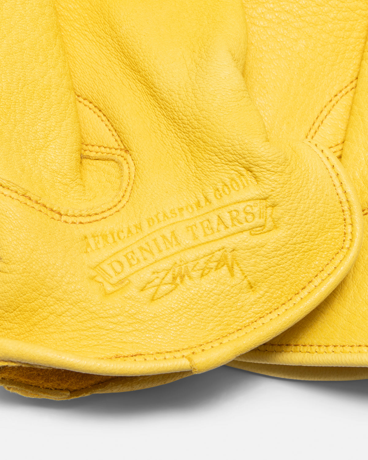 Stüssy & Denim Tears Leather Gloves in yellow – Stüssy Europe