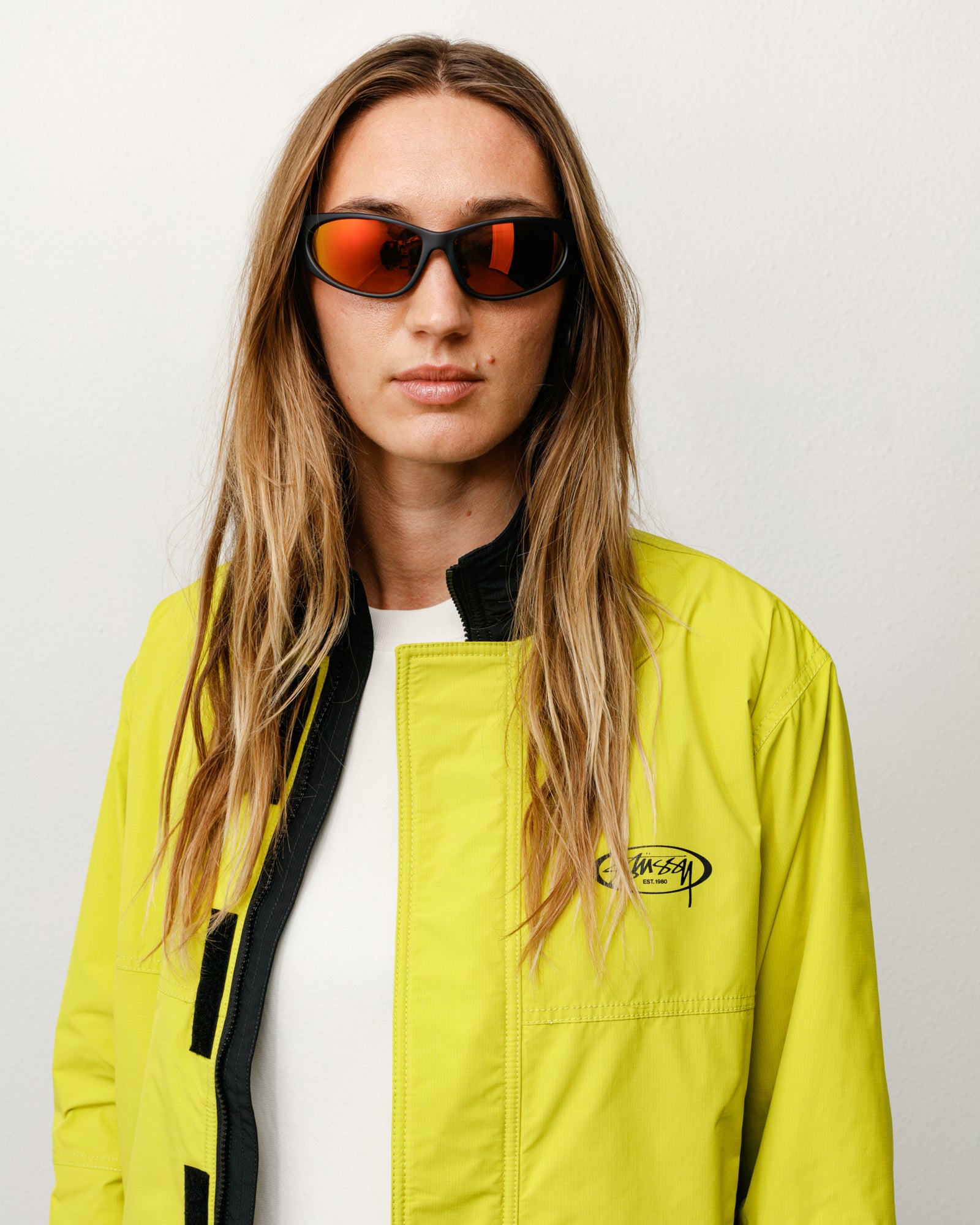 Adrian Sunglasses Unisex In Frost Black/orange Mirror Lens