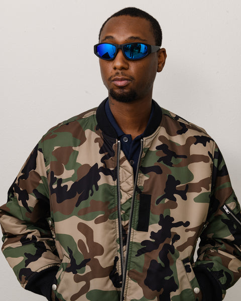 Leslie Sunglasses Unisex In Matte Black Rubber/blue Mirror